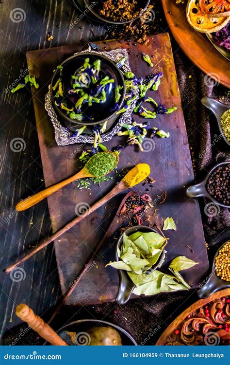 Top View Spices And Herbs Ingredient Decoration On Wood Table For Cook