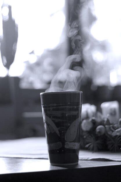 Close Up Of Hot Coffee On Table Premium Photo