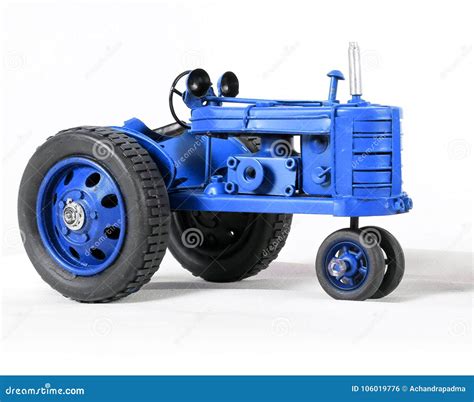 Blue Toy Tractor on White stock photo. Image of bright - 106019776