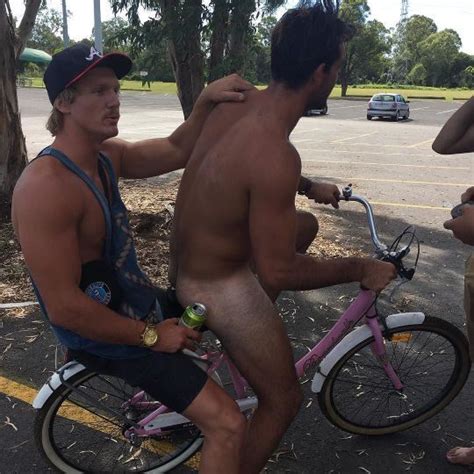 Naked Riding A Bike With A Mate Scrolller