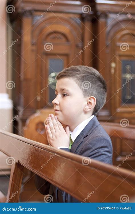 Boy Kneeling And Praying In The Church Stock Photo Image Of Pray