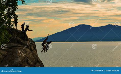 Cliff Diving at Kande Beach, Nkhata Bay, Lake Malawi, Malawi Stock ...