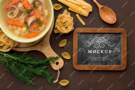 Premium Psd Flat Lay Of Chalkboard With Bowl Of Soup