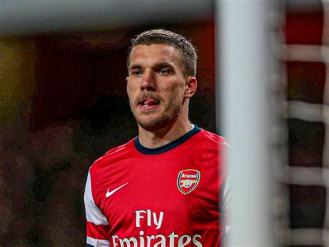 Podolski says Arsenal should have signed Spurs star last summer