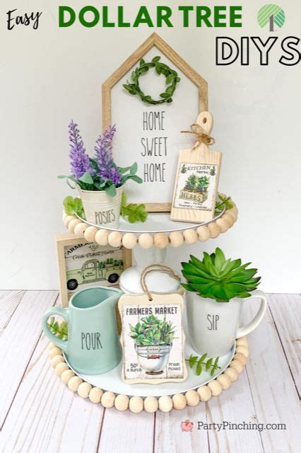 Three Tiered Tray With Potted Plants And Other Items On It That Says