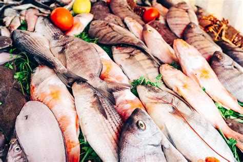 Different Types of Fresh Sea Fish on a Market Table. Stock Image ...