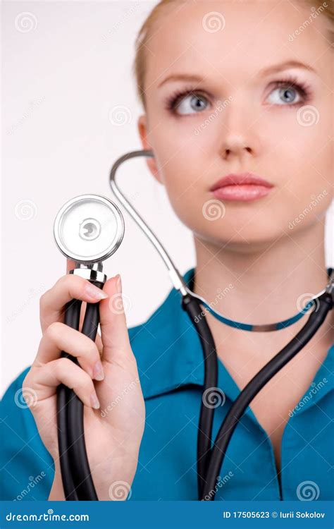 Listening A Heartbeat By Stethoscope Stock Photos - Image: 17505623