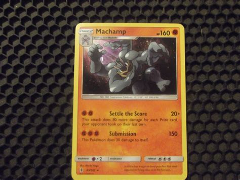 Machamp Cosmos Holo Guardians Rising Pokemon Card Values Mavin