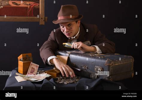 Numismatist with his coin collection Stock Photo - Alamy