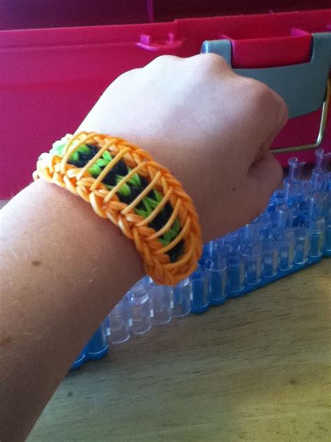 A Person Is Wearing A Bracelet Made Out Of Plastic Bottles And Rubber