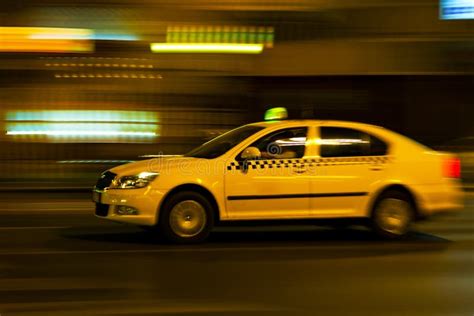 Yellow taxi stock image. Image of night, moves, downtown - 47634825