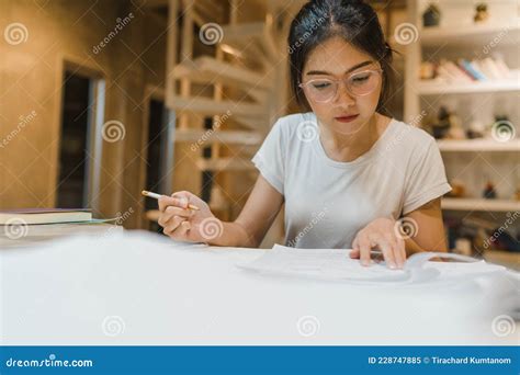 Asian Student Women Reading Books In Library At University Young