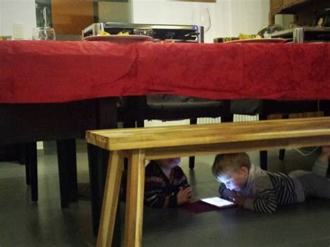 Child Hiding Under Table Stock Photos Pictures And Royalty Free Images