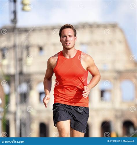 Runner Man Running At Rome Marathon Near Colosseum Stock Photo Image