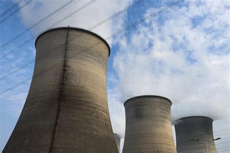 Tops of cooling towers stock image. Image of pollution - 49976693