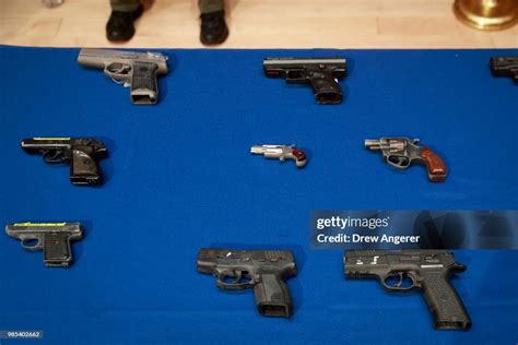 Guns belonging to members of the Mac Balla gang are displayed during ...