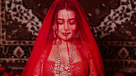 Neha Kakkars Red Falguni Shane Peacock Lehenga Will Remind You Of