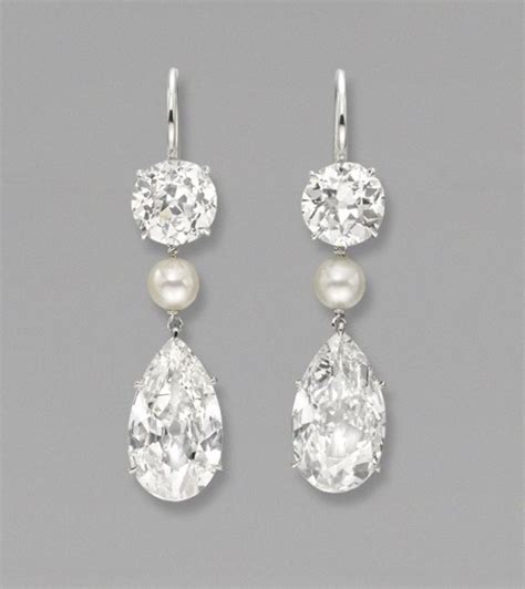 A Pair Of Diamond And Pearl Ear Pendants Price Realised Usd