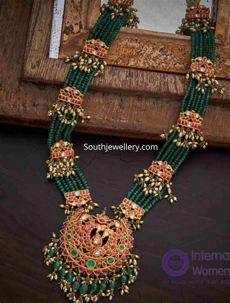 Multi String Emerald Beads Necklace With Kundan Peacock Pendant