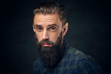 Free Photo Close Up Portrait Of Bearded Male With Long Hair Over Dark