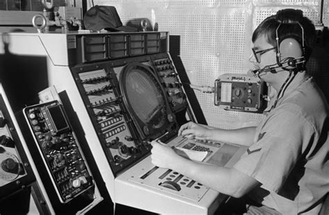 Petty Officer Third Class Po Myers Monitors A Radar Console Aboard