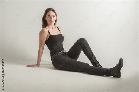 Woman Sitting On Bed Back