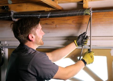 how to open garage door if spring is broken