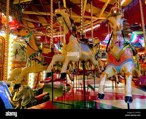 Three Fairground Carousel Horses On The Vintage Ride At Dingles