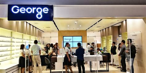 george optical   george reopens flagship store  sm megamall