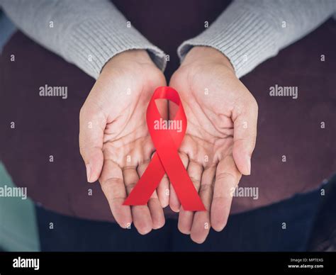 Closeup Woman Hands Holding Red Ribbon Hiv World Aids Day Awareness