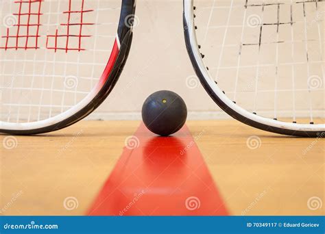 Squash Ball Between Two Squash Rackets Stock Image Image Of