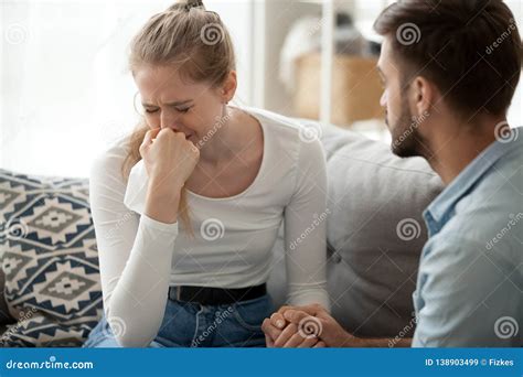 Loving Husband Man Comforting Consoling Upset Crying Wife Woman Stock