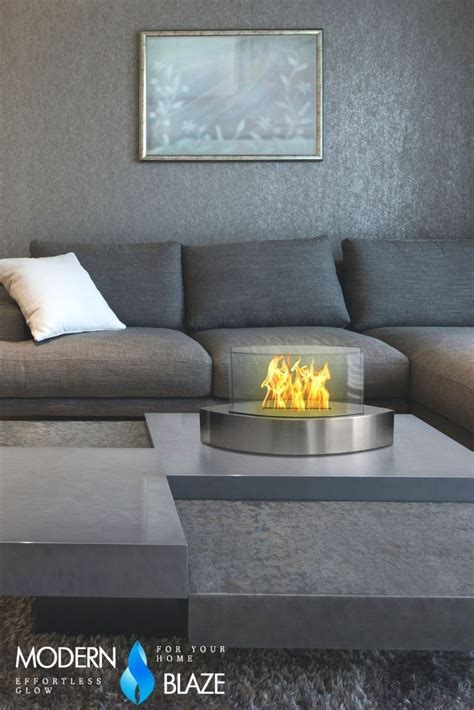 Modern tabletop fireplace with real flames. Availble in 5 colors to match your decor. Tabletop ...