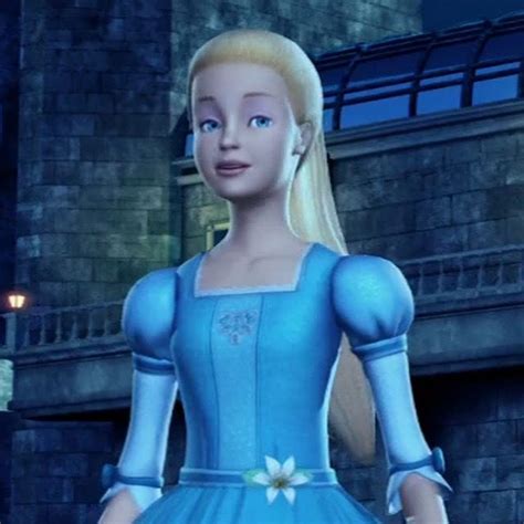 the princess in her blue dress is standing outside