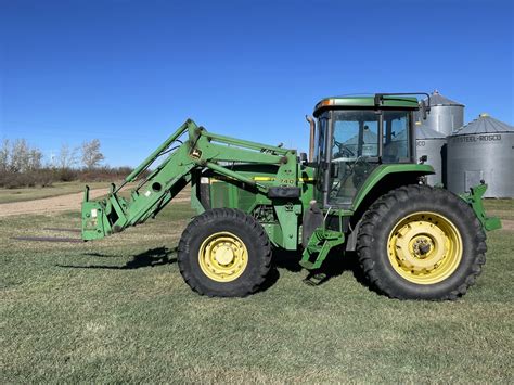 Dunkle Auction Services 1997 JOHN DEERE 7610 MFWD Tractor W JD 740