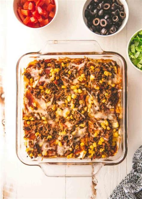 With Ground Beef Cheese Enchilada Sauce And Tortillas This Easy Casserole Is Freezer