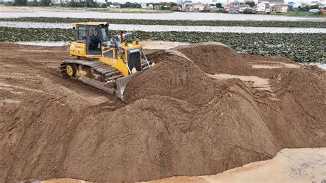 Amazing Sand Filling Operation Dozer Shantui Pushing Dump Truck