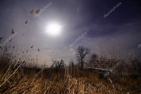 Full moon halo rays - night full moon landscape — Stock Photo © qliebin ...