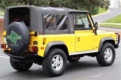 1994 AA Yellow Land Rover Defender | Adventure Motor Cars