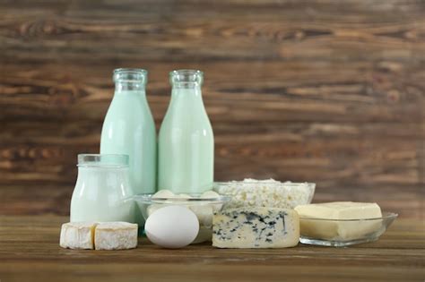 Premium Photo Different Dairy Products On Wooden Background