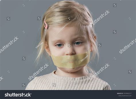 7 Little Kid Scotched Taped Mouth Images, Stock Photos, and Vectors ...