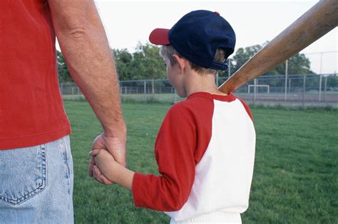 Father And Son Playing Baseball