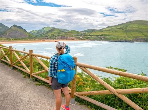 Premium Photo Lonely Pilgrim With Backpack Walking The Camino De