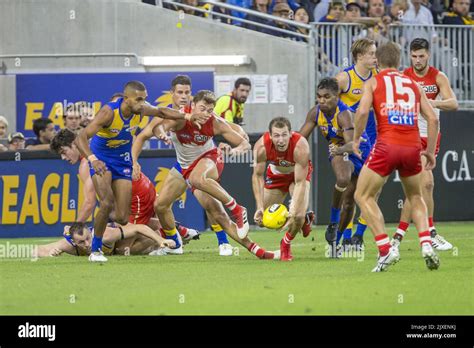 Sydney S Harry Cunningham Handballs During The Round 1 AFL Match