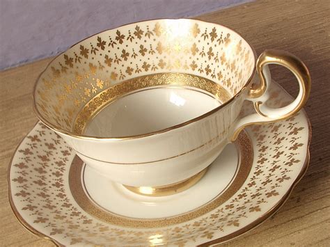 S Gold Tea Cup And Saucer Set Aynsley By Shoponsherman