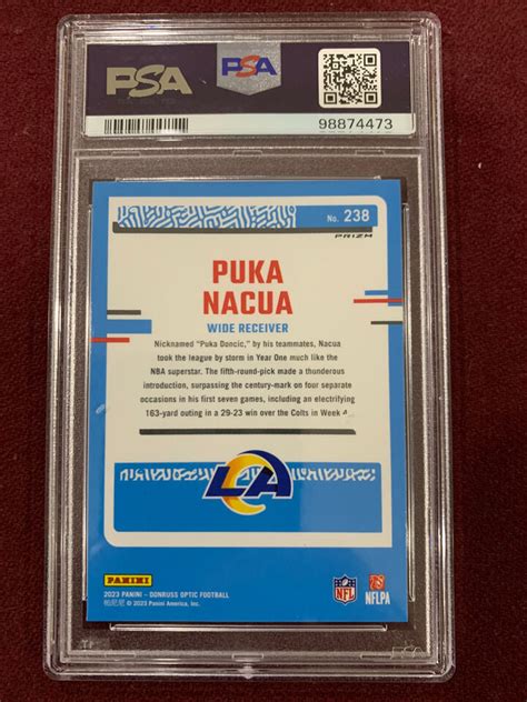 Puka Nacua Panini Donruss Optic Purple Shock Prizm Rookie Card Psa