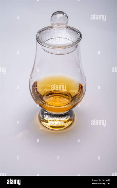 Tulip Shaped Tasting Glass With Dram Of Scotch Single Malt Or Blended