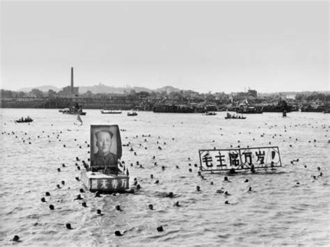 Mao was swimming together with six bodyguards and gigantic portraits of ...