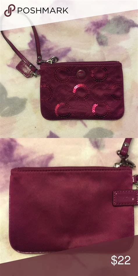 Pink Coach Wristlet Magenta wristlet with sequins on the front and ...