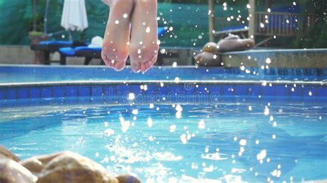 Woman In Pink Bikini Jumping Into Swimming Pool In Slow Motion